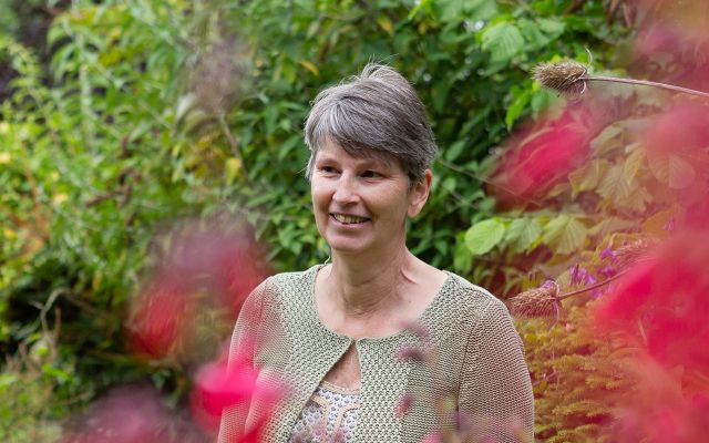 Photo of Janet Manning in her garden