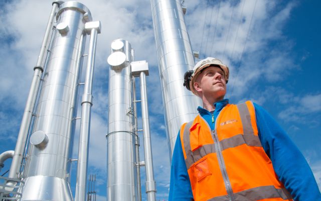 Construction work in front of pipes